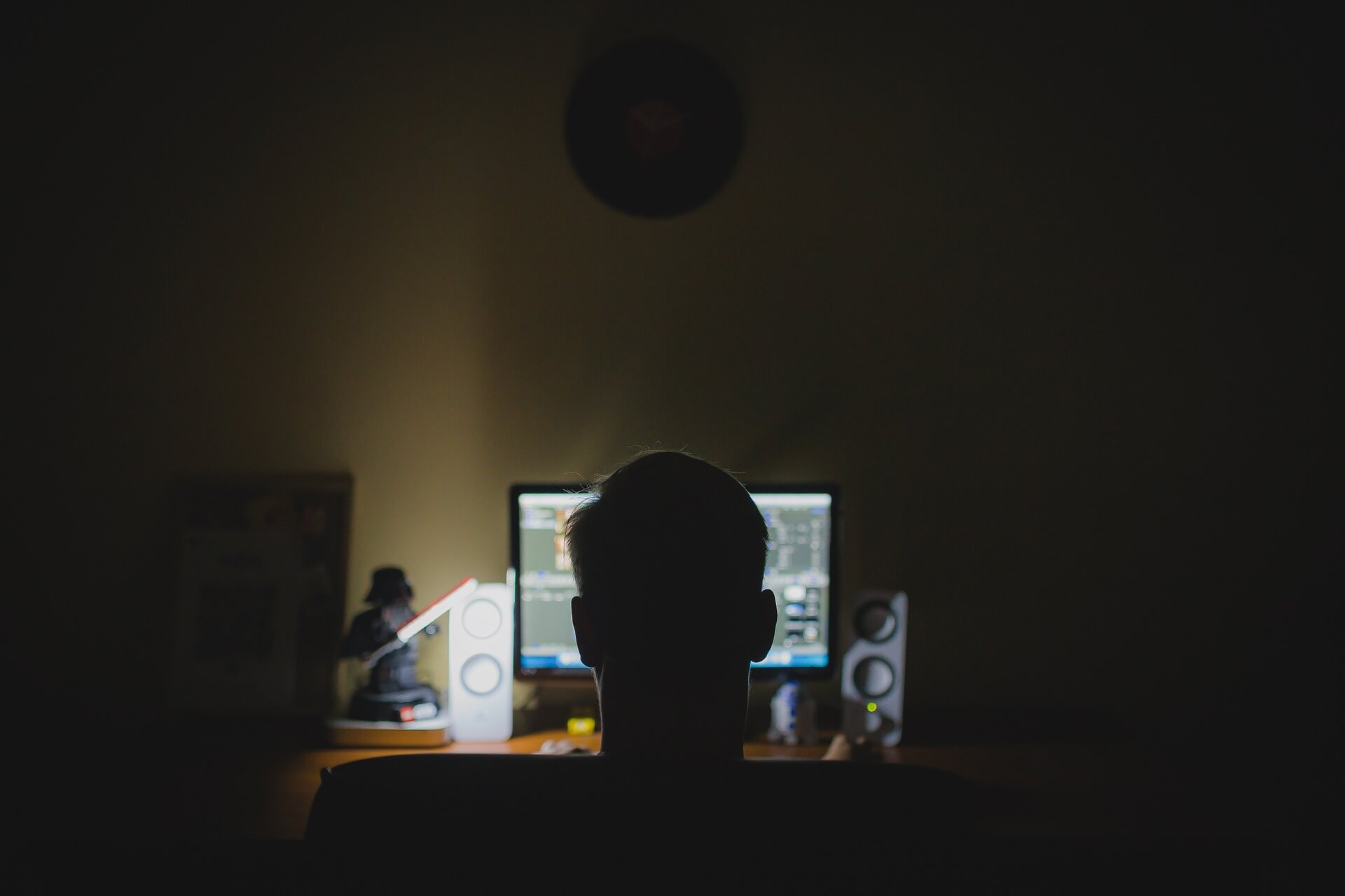 Man Sitting At Computer