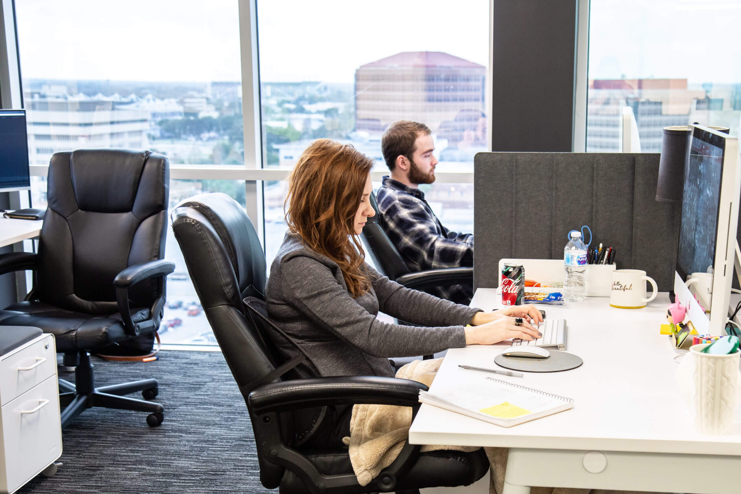 group of marketers working at their computers