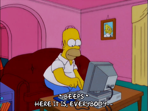 Gif of Homer Simpson unveiling a computer project to his family