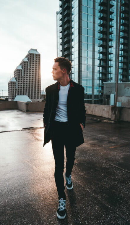 A man walking on a rooftop
