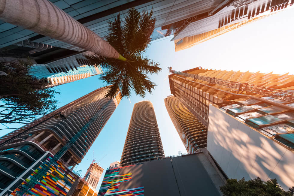 Looking up view of tall buildings
